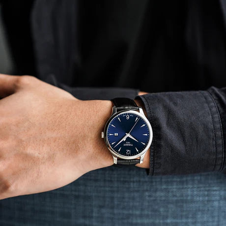 TISSOT Men’s Swiss Made Quartz Black Leather Strap Blue Dial 42mm Watch T063.610.16.047.00
